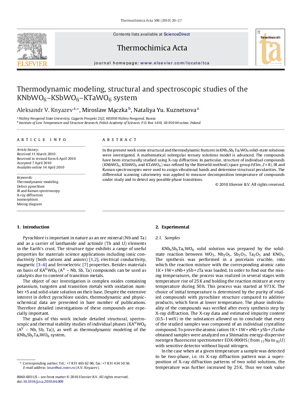 Thermodynamic modeling, structural and spectroscopic studies of the KNbWO6–KSbWO6–KTaWO6 system