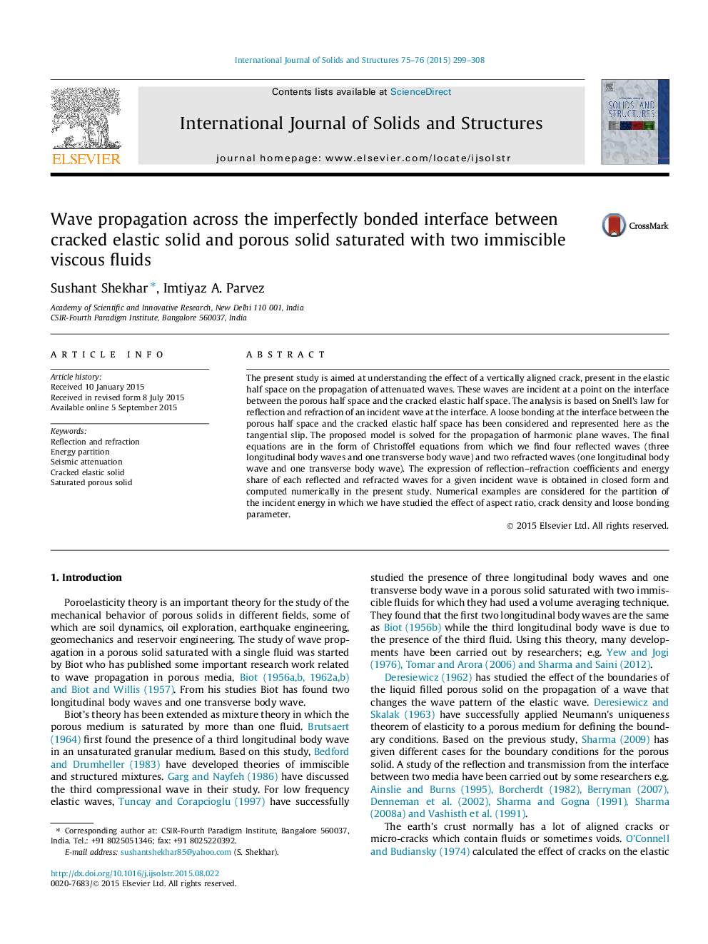 Wave propagation across the imperfectly bonded interface between cracked elastic solid and porous solid saturated with two immiscible viscous fluids