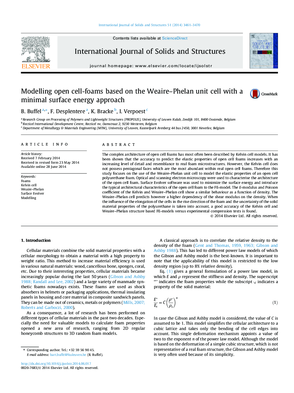 Modelling open cell-foams based on the Weaire-Phelan unit cell with a minimal surface energy approach