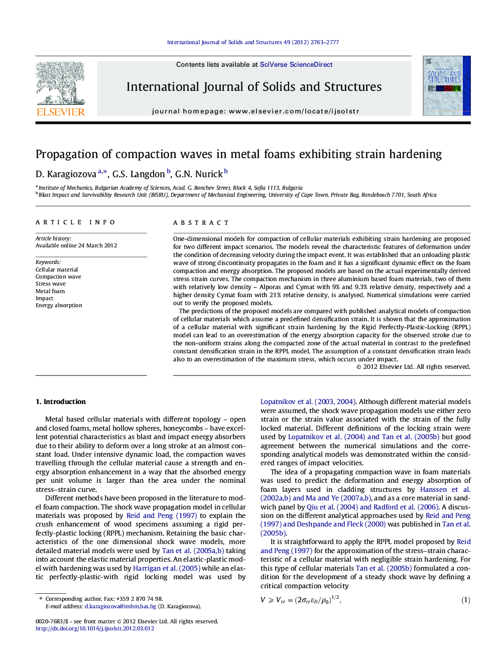 Propagation of compaction waves in metal foams exhibiting strain hardening