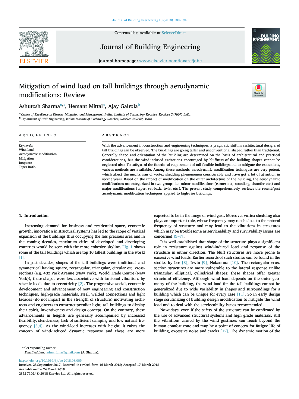 Mitigation of wind load on tall buildings through aerodynamic modifications: Review