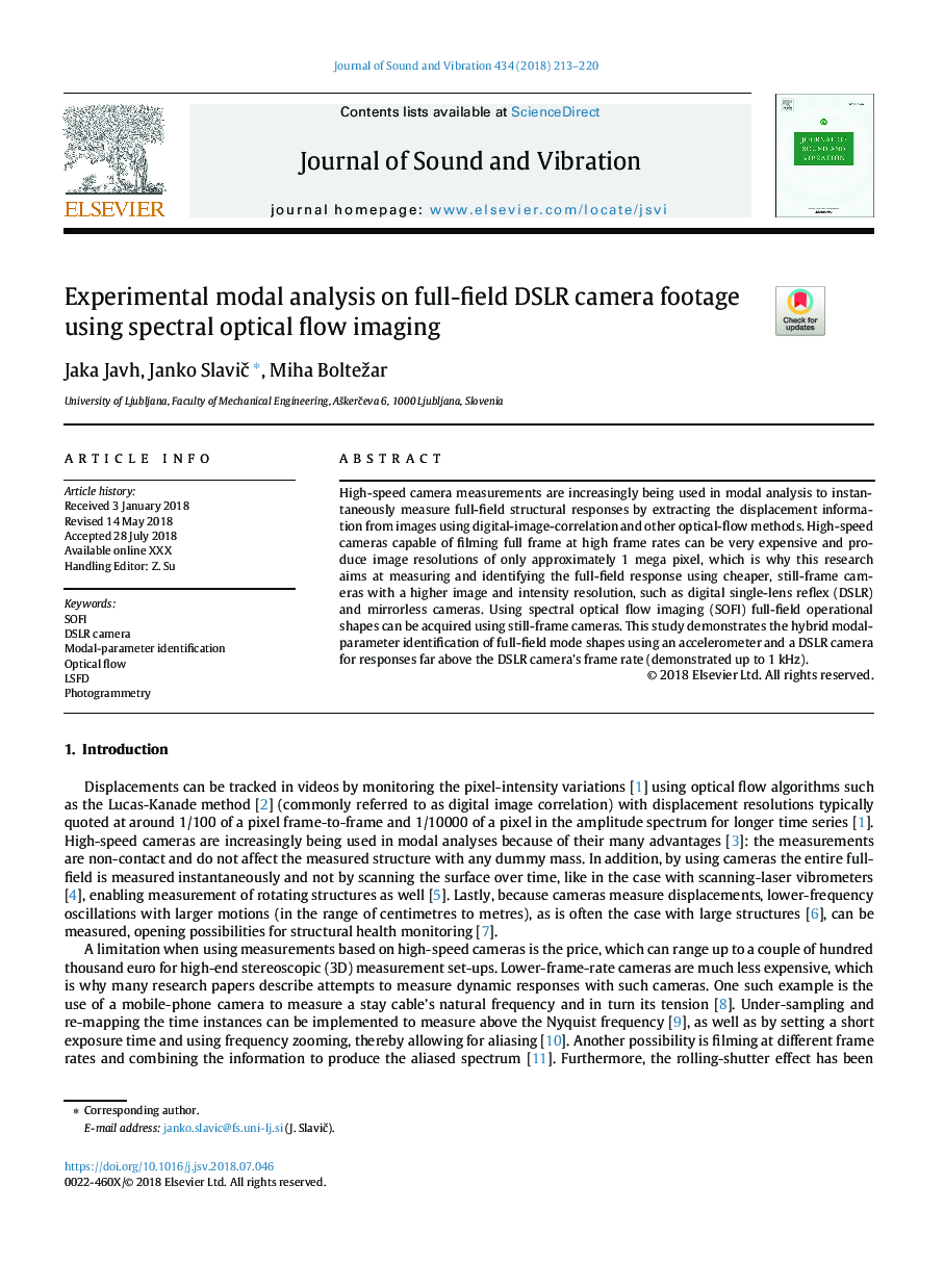 Experimental modal analysis on full-field DSLR camera footage using spectral optical flow imaging