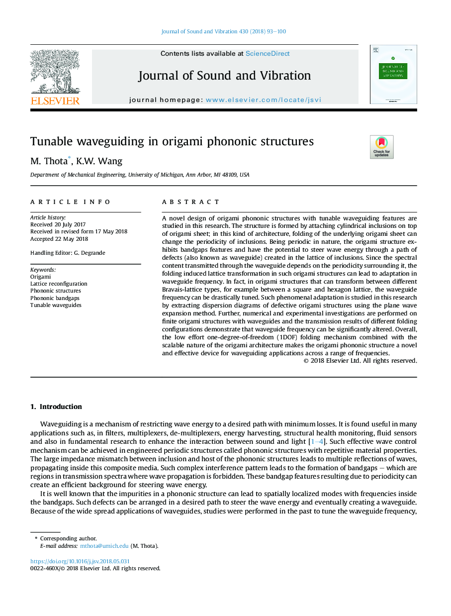 Tunable waveguiding in origami phononic structures