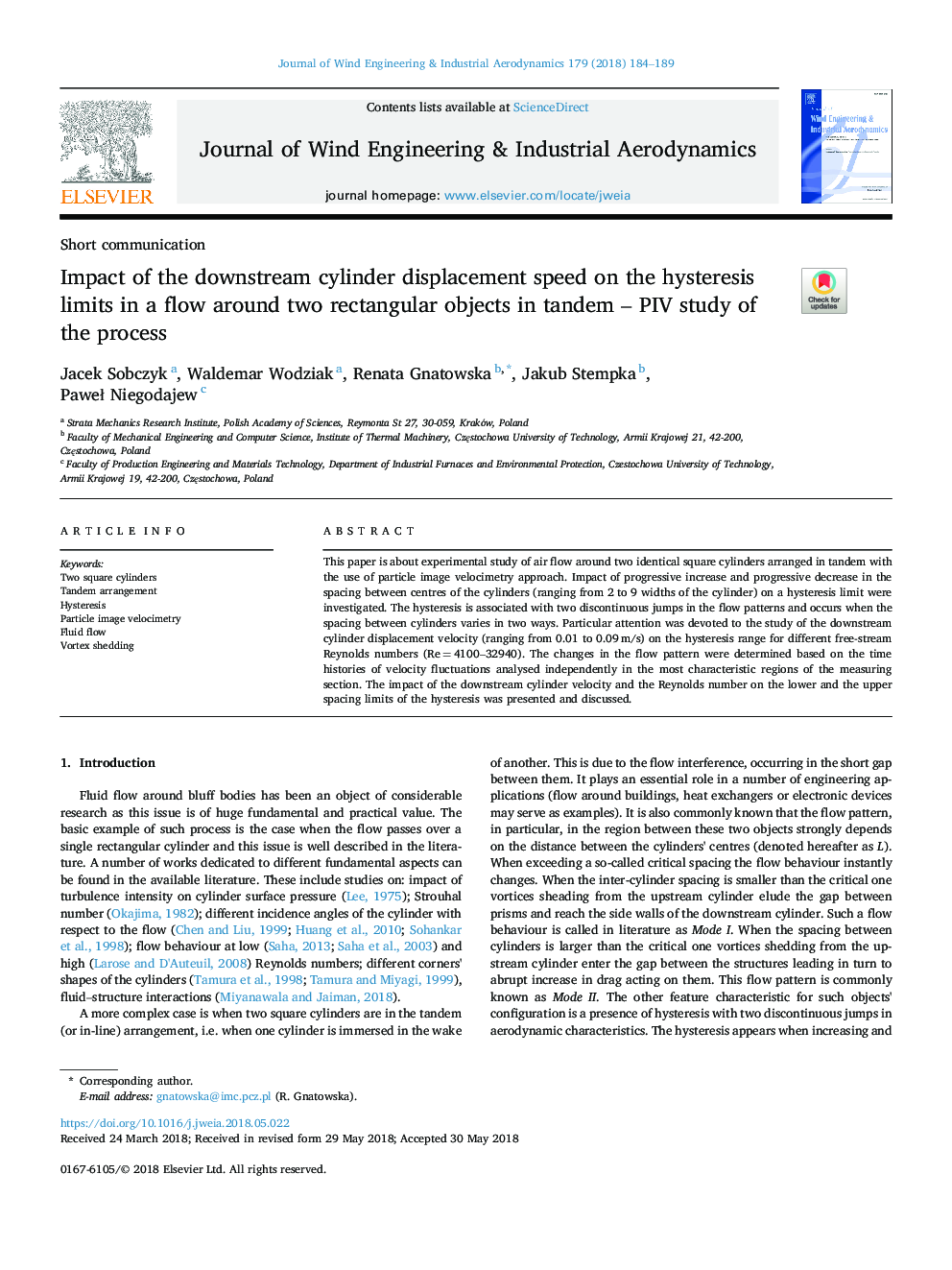 Impact of the downstream cylinder displacement speed on the hysteresis limits in a flow around two rectangular objects in tandem - PIV study of the process