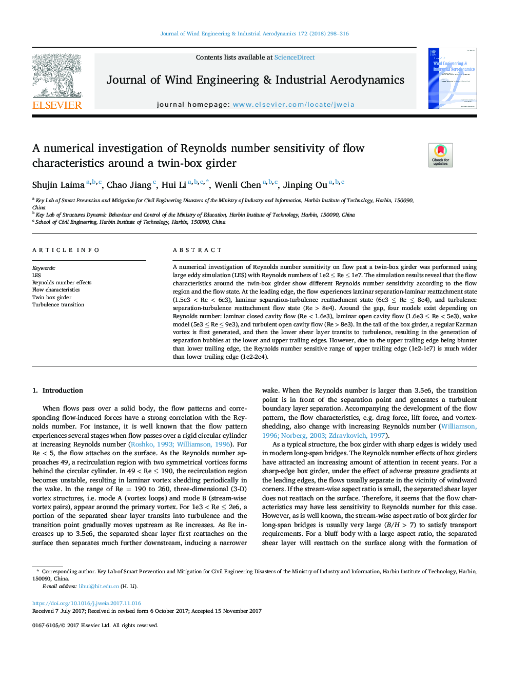 A numerical investigation of Reynolds number sensitivity of flow characteristics around a twin-box girder