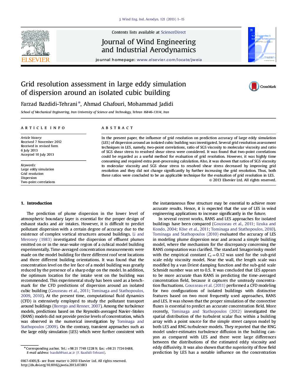 Grid resolution assessment in large eddy simulation of dispersion around an isolated cubic building