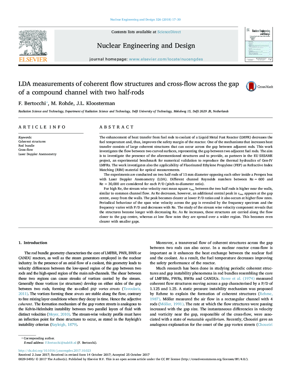 LDA measurements of coherent flow structures and cross-flow across the gap of a compound channel with two half-rods