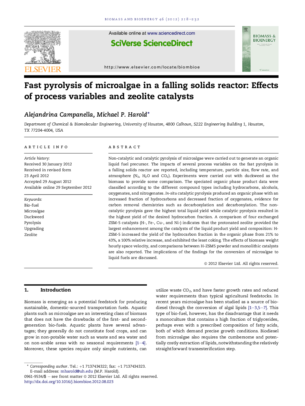 Fast pyrolysis of microalgae in a falling solids reactor: Effects of process variables and zeolite catalysts