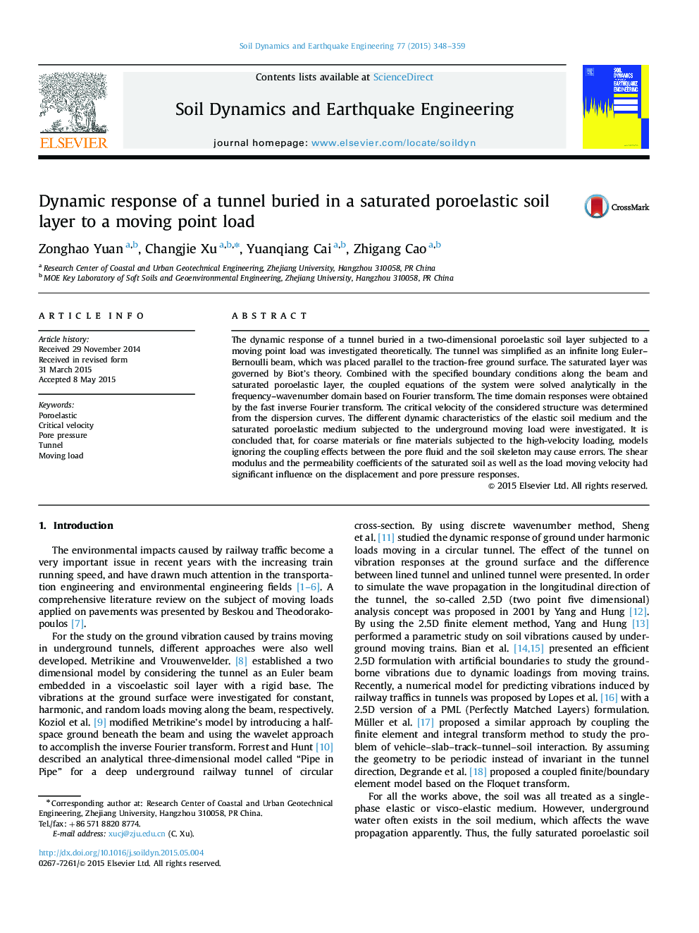 Dynamic response of a tunnel buried in a saturated poroelastic soil layer to a moving point load