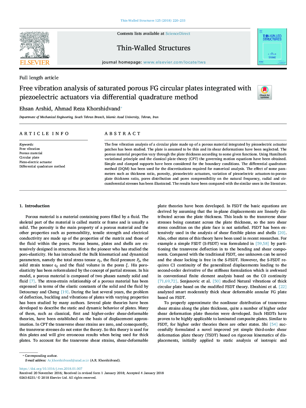 Free vibration analysis of saturated porous FG circular plates integrated with piezoelectric actuators via differential quadrature method