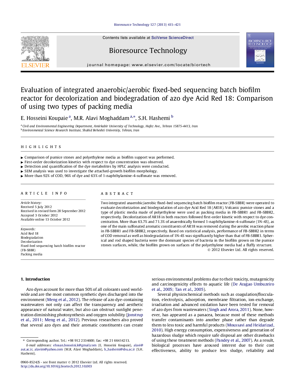 Evaluation of integrated anaerobic/aerobic fixed-bed sequencing batch biofilm reactor for decolorization and biodegradation of azo dye Acid Red 18: Comparison of using two types of packing media