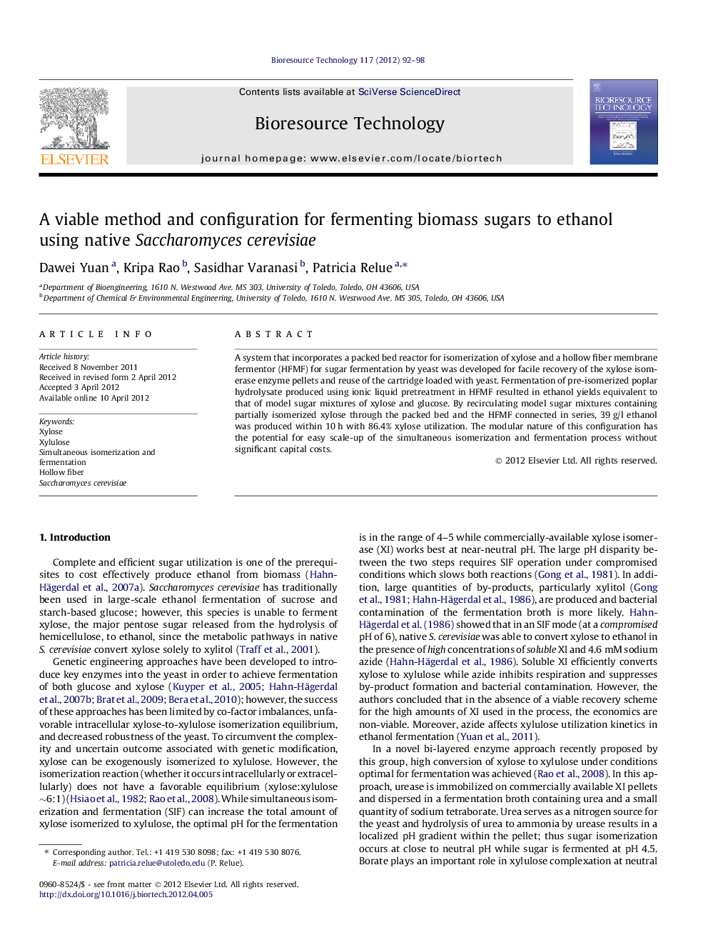 A viable method and configuration for fermenting biomass sugars to ethanol using native Saccharomyces cerevisiae