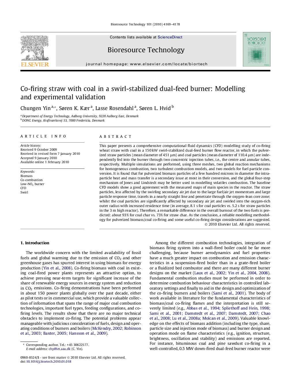 Co-firing straw with coal in a swirl-stabilized dual-feed burner: Modelling and experimental validation