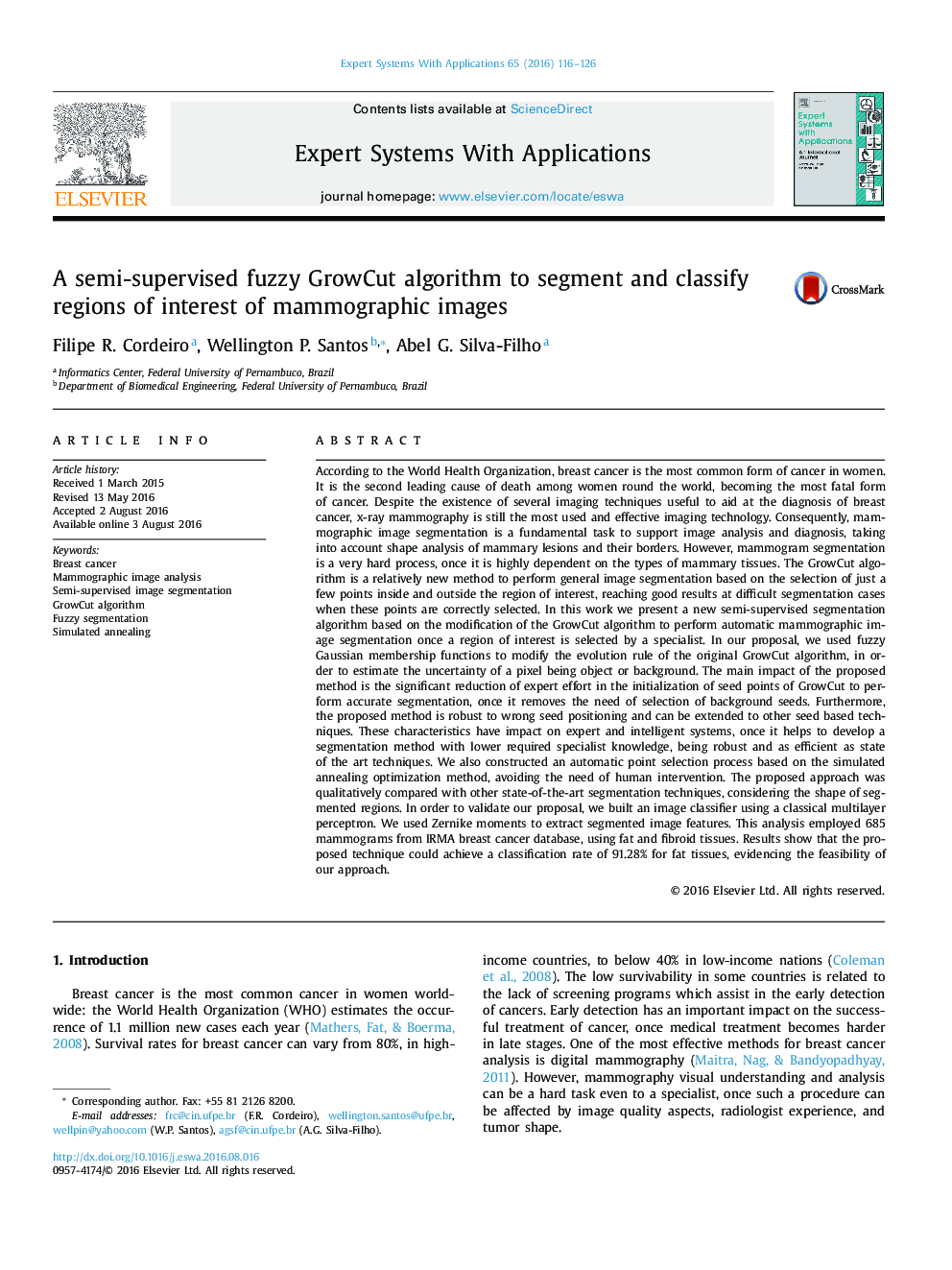 A semi-supervised fuzzy GrowCut algorithm to segment and classify regions of interest of mammographic images