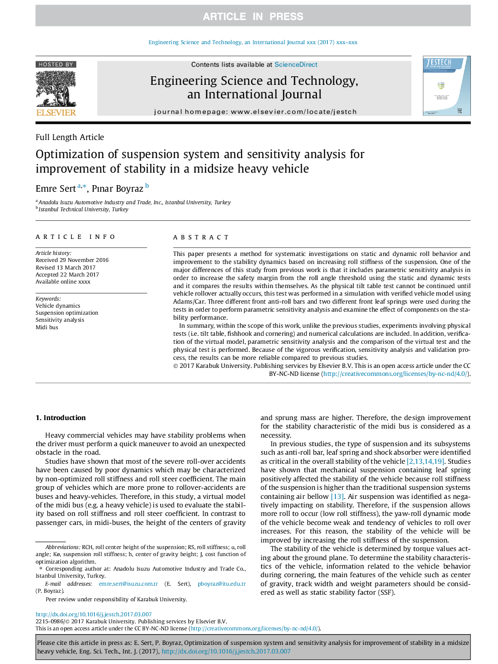 Optimization of suspension system and sensitivity analysis for improvement of stability in a midsize heavy vehicle