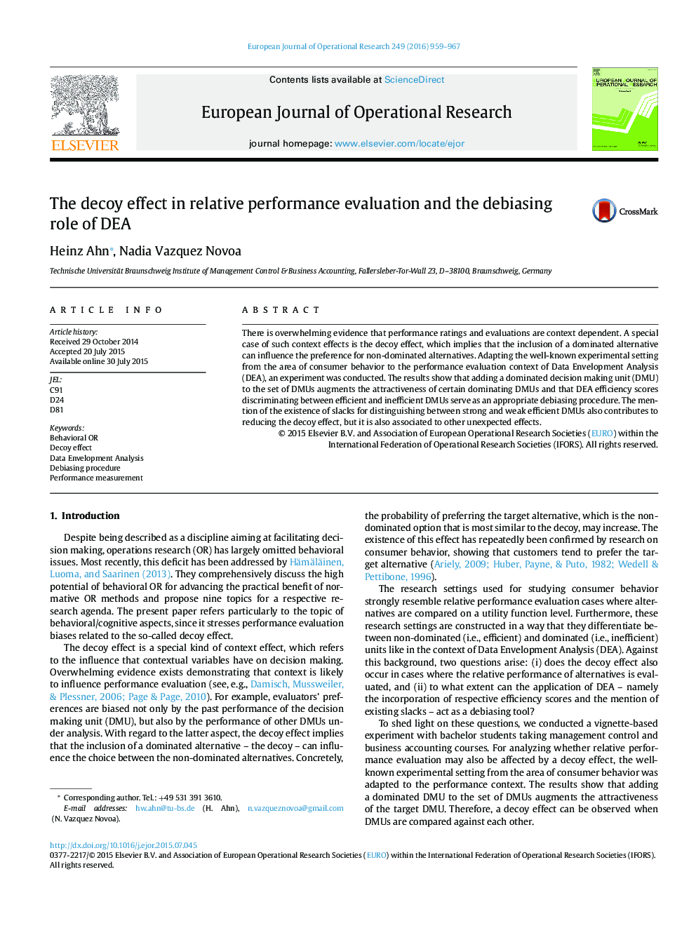 The decoy effect in relative performance evaluation and the debiasing role of DEA