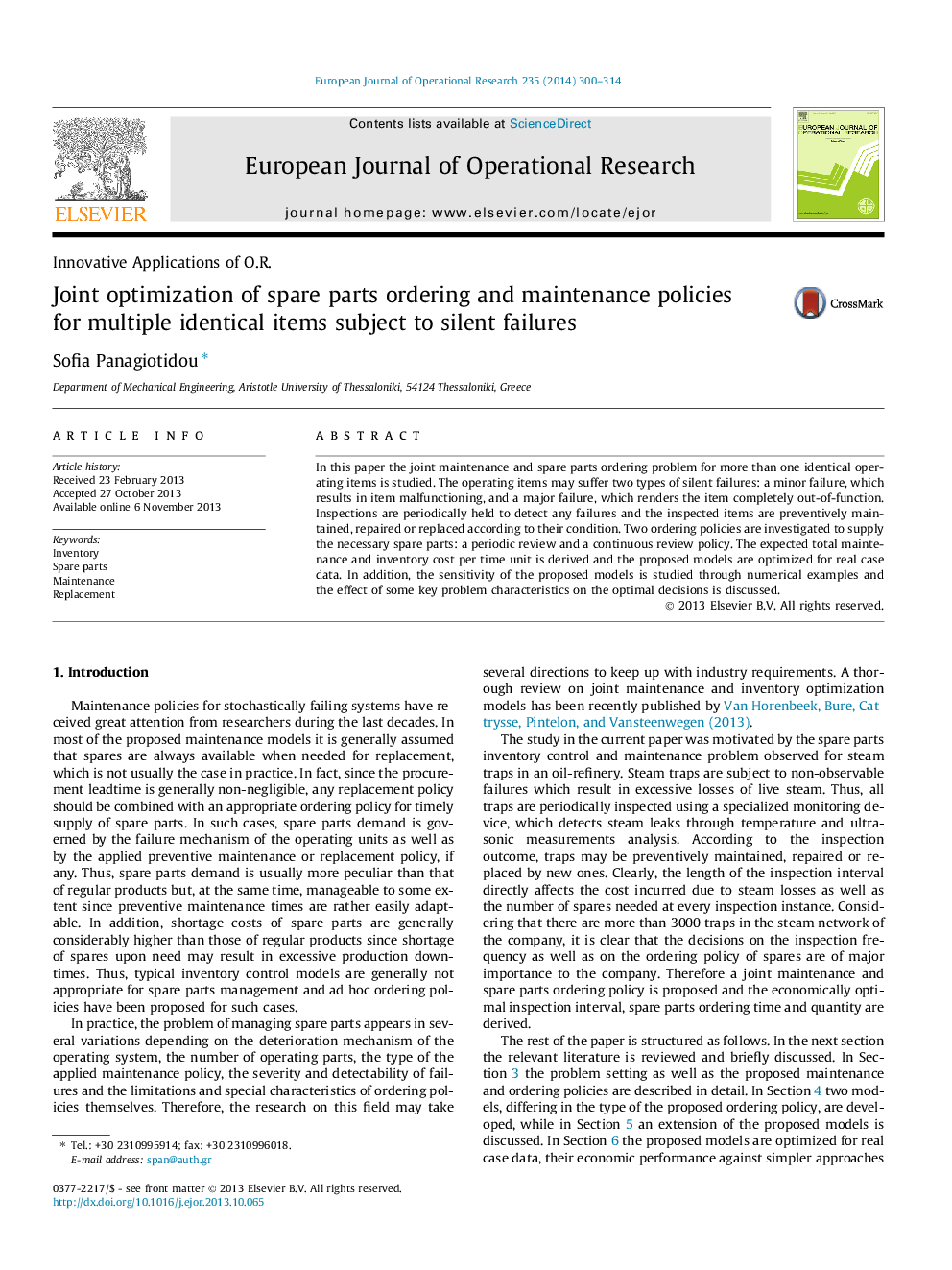 Joint optimization of spare parts ordering and maintenance policies for multiple identical items subject to silent failures