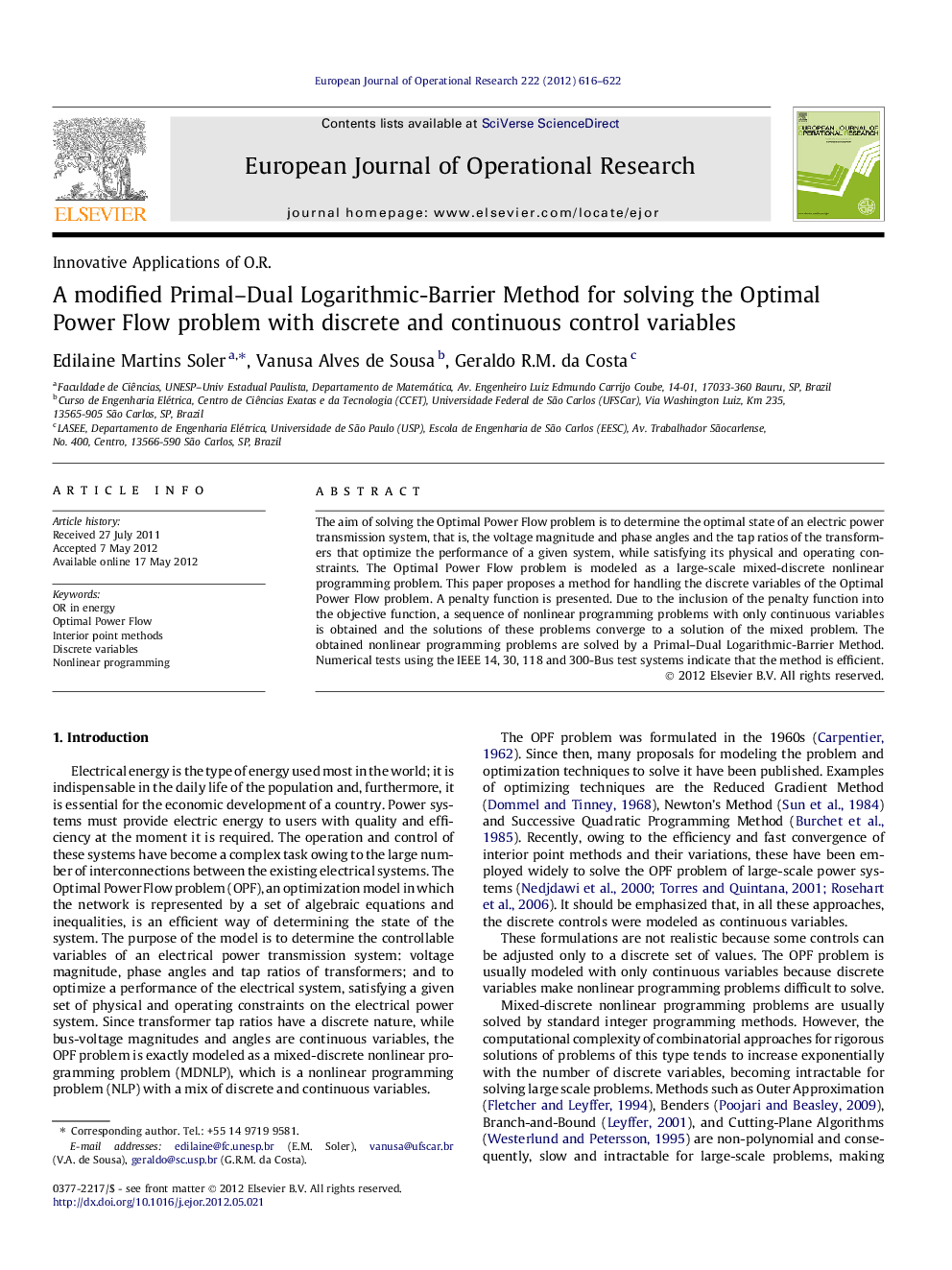 A modified Primal-Dual Logarithmic-Barrier Method for solving the Optimal Power Flow problem with discrete and continuous control variables