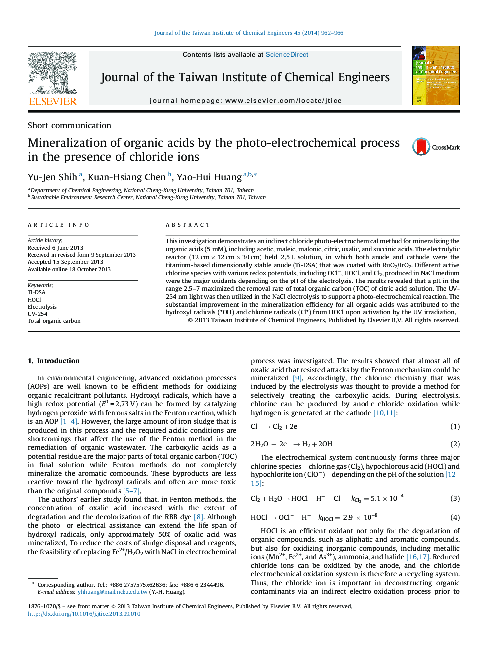 Mineralization of organic acids by the photo-electrochemical process in the presence of chloride ions