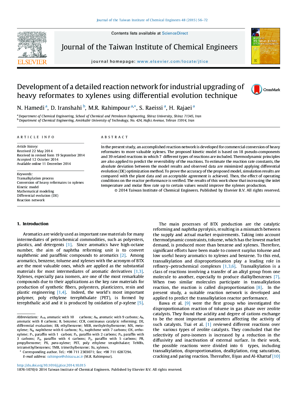 Development of a detailed reaction network for industrial upgrading of heavy reformates to xylenes using differential evolution technique