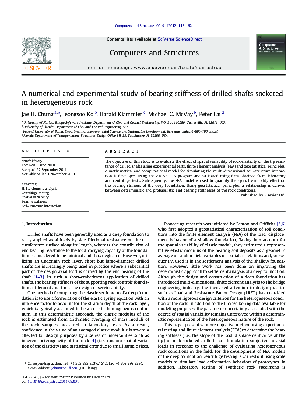 A numerical and experimental study of bearing stiffness of drilled shafts socketed in heterogeneous rock