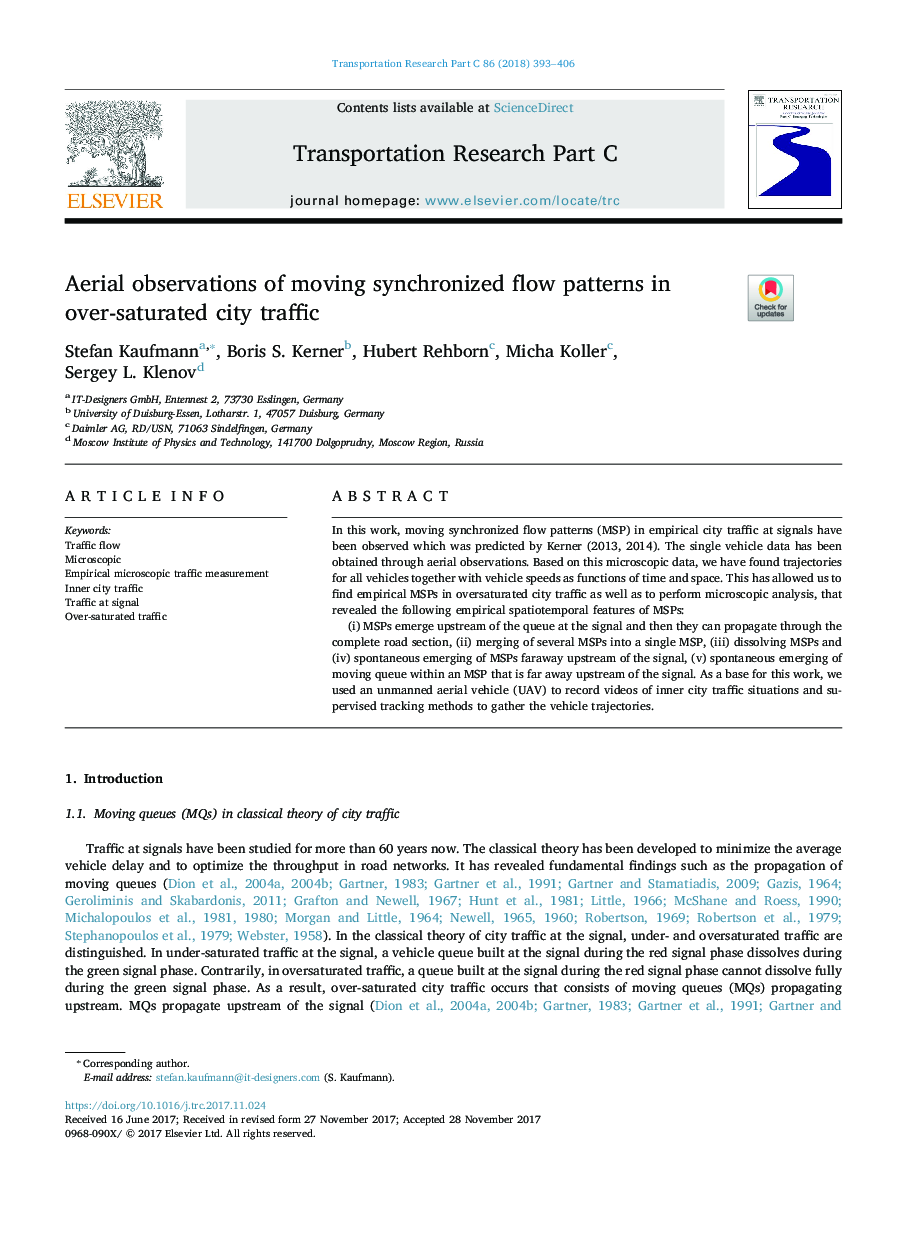 Aerial observations of moving synchronized flow patterns in over-saturated city traffic