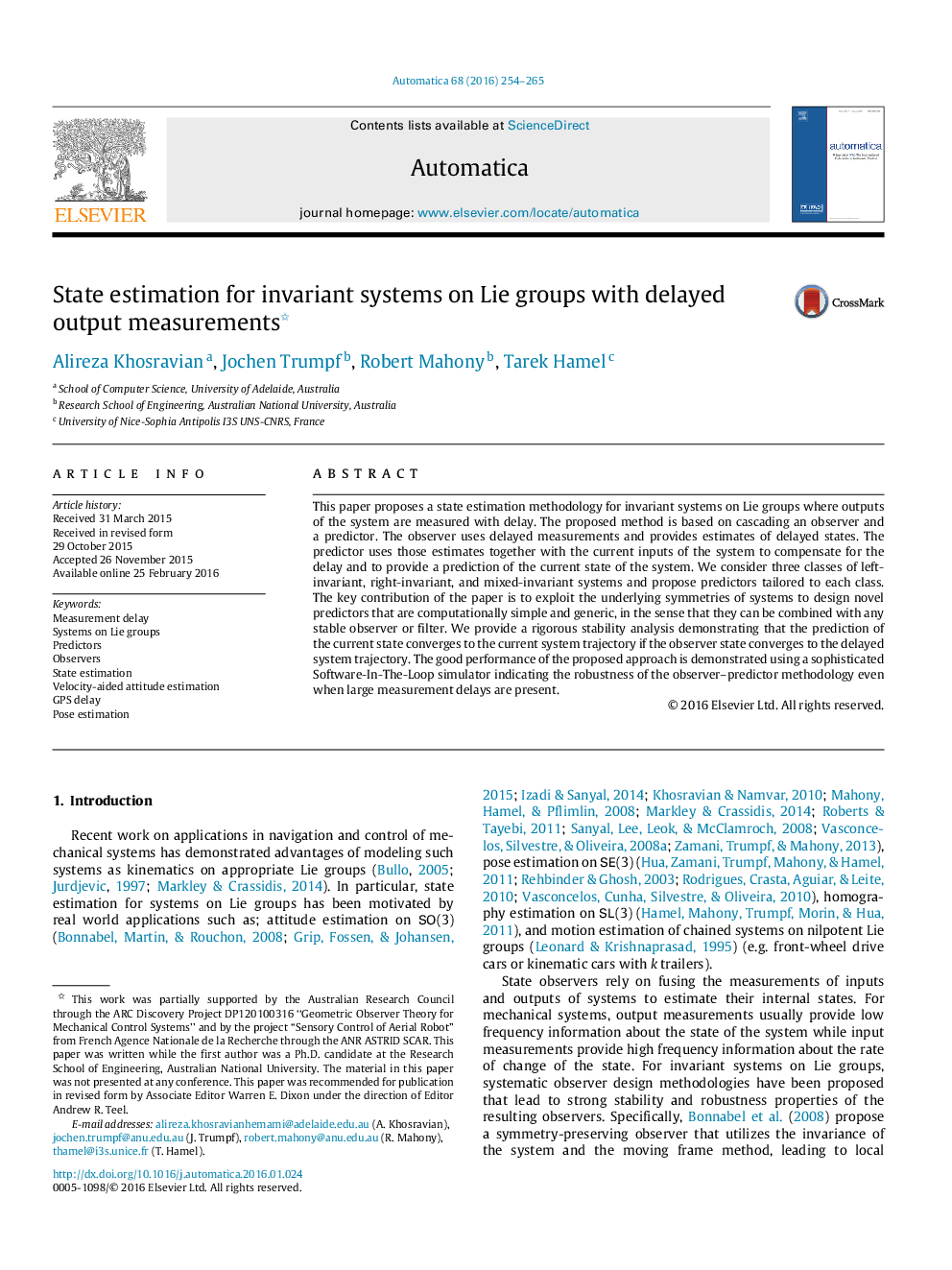 State estimation for invariant systems on Lie groups with delayed output measurements 