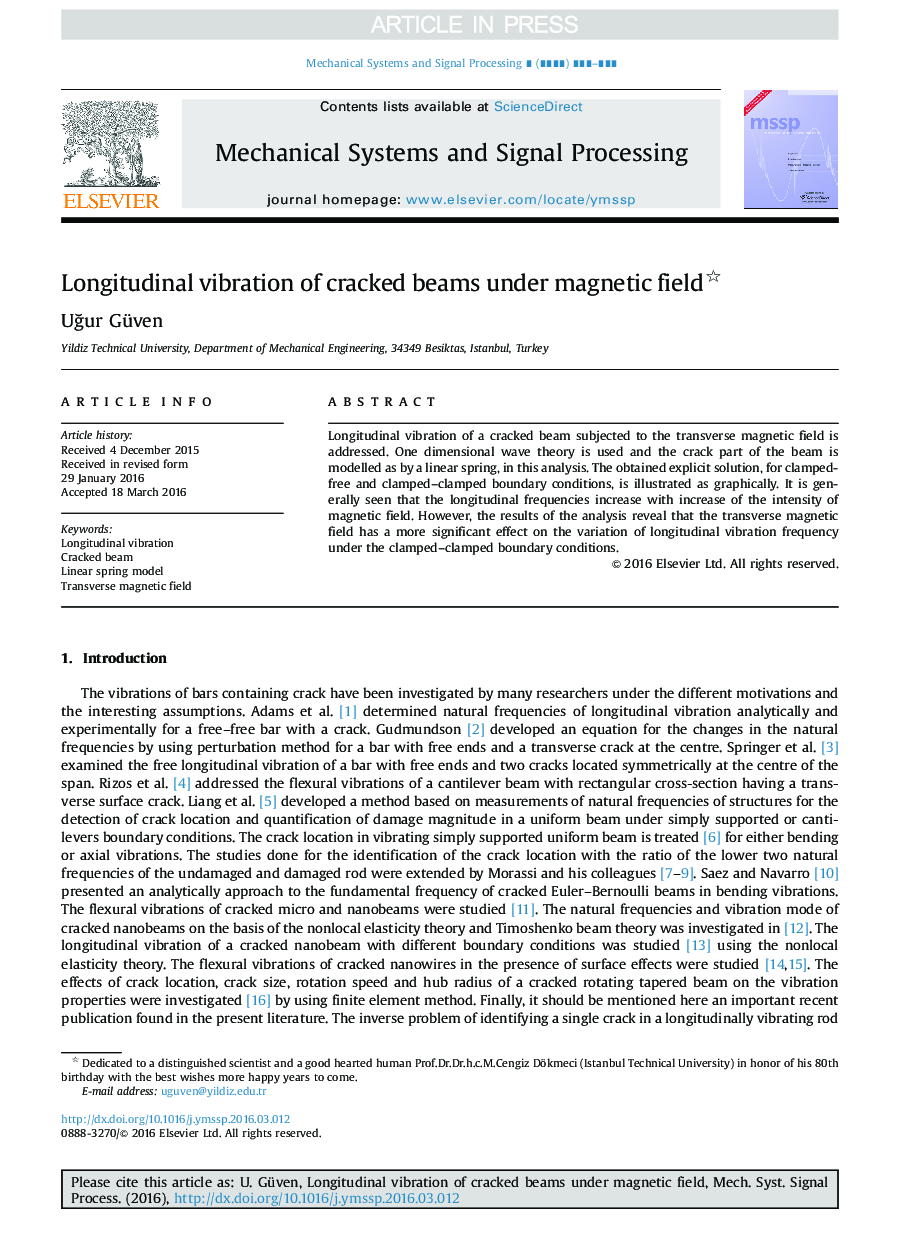 Longitudinal vibration of cracked beams under magnetic field