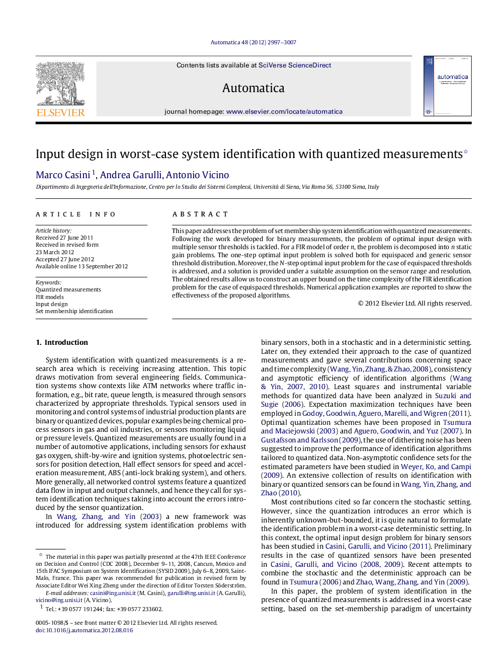 Input design in worst-case system identification with quantized measurements 