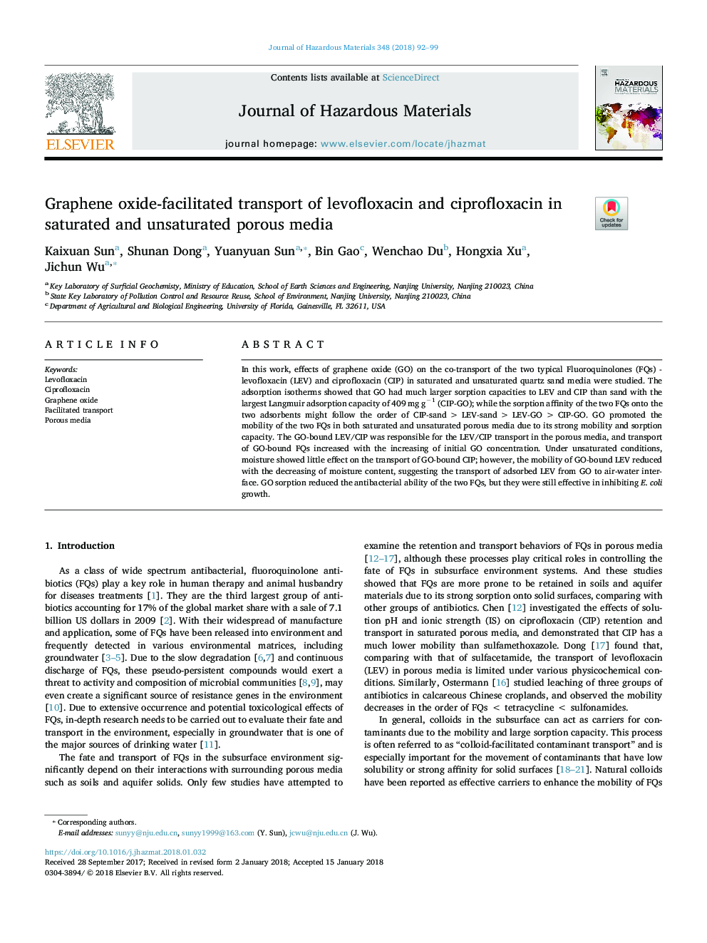 Graphene oxide-facilitated transport of levofloxacin and ciprofloxacin in saturated and unsaturated porous media