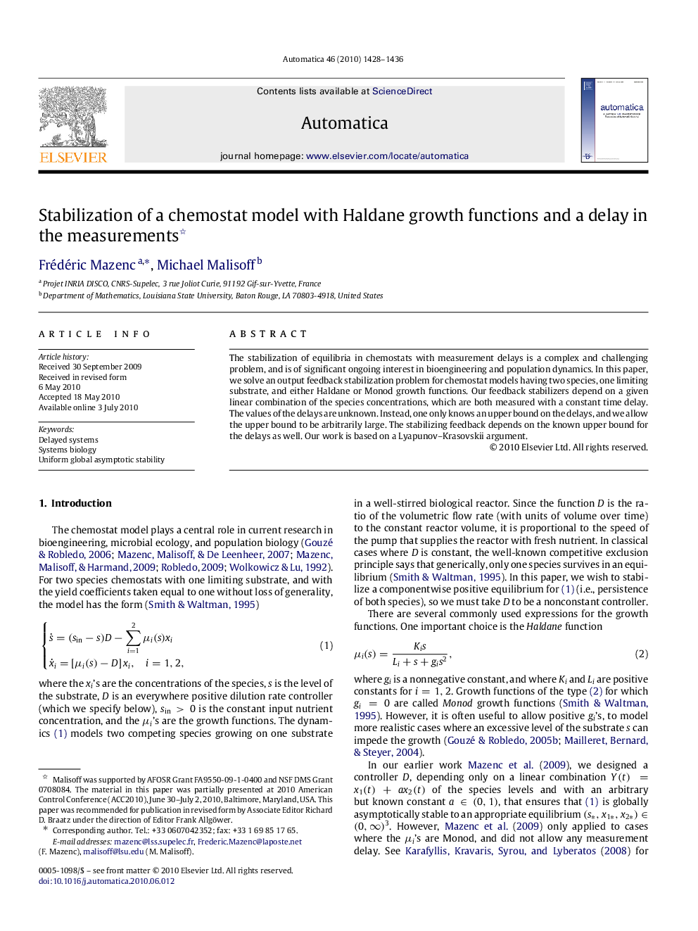 Stabilization of a chemostat model with Haldane growth functions and a delay in the measurements 