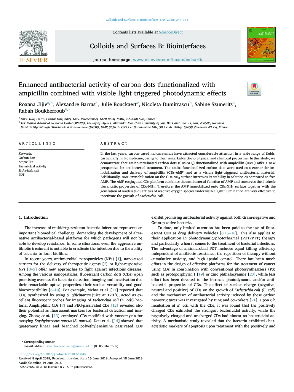 Enhanced antibacterial activity of carbon dots functionalized with ampicillin combined with visible light triggered photodynamic effects