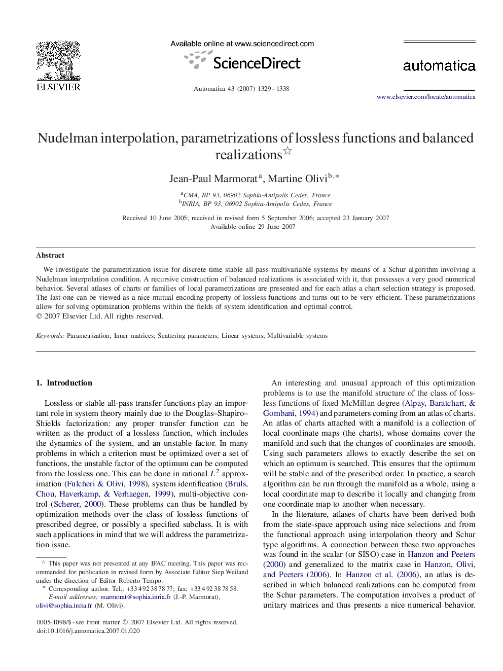 Nudelman interpolation, parametrizations of lossless functions and balanced realizations 