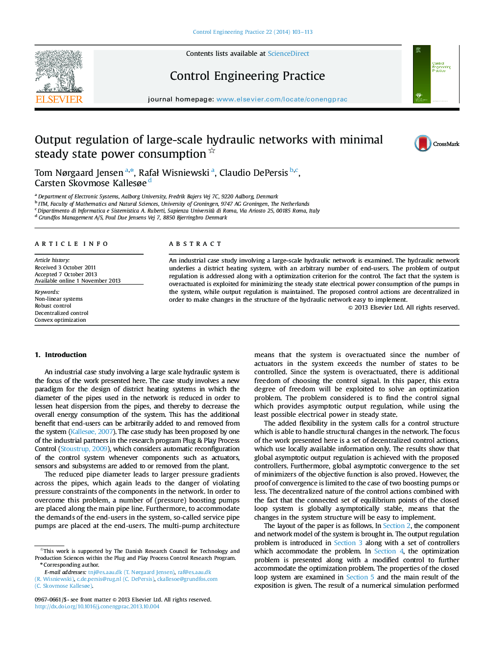 Output regulation of large-scale hydraulic networks with minimal steady state power consumption 