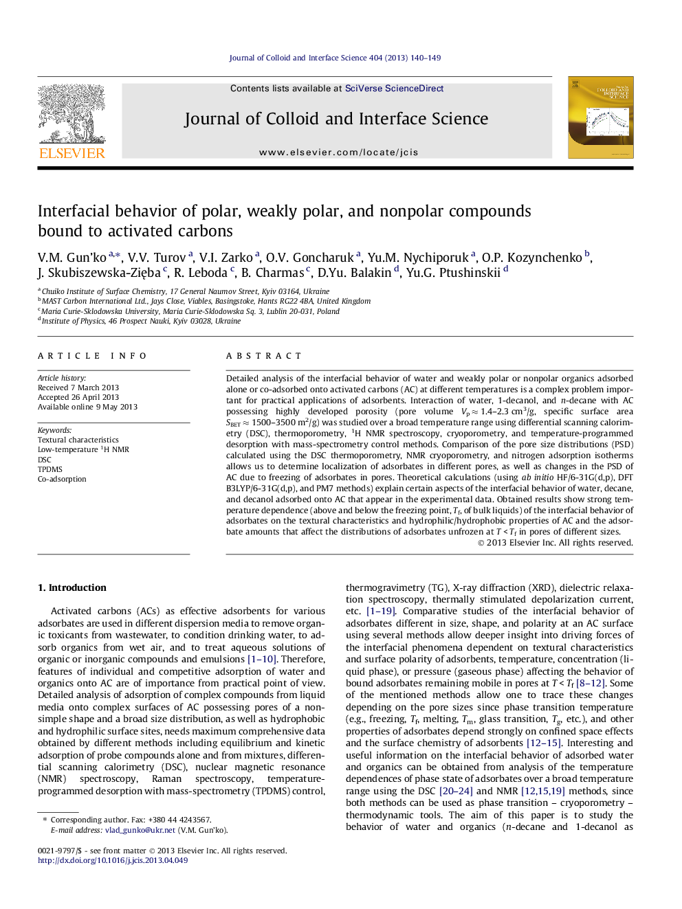 Interfacial behavior of polar, weakly polar, and nonpolar compounds bound to activated carbons