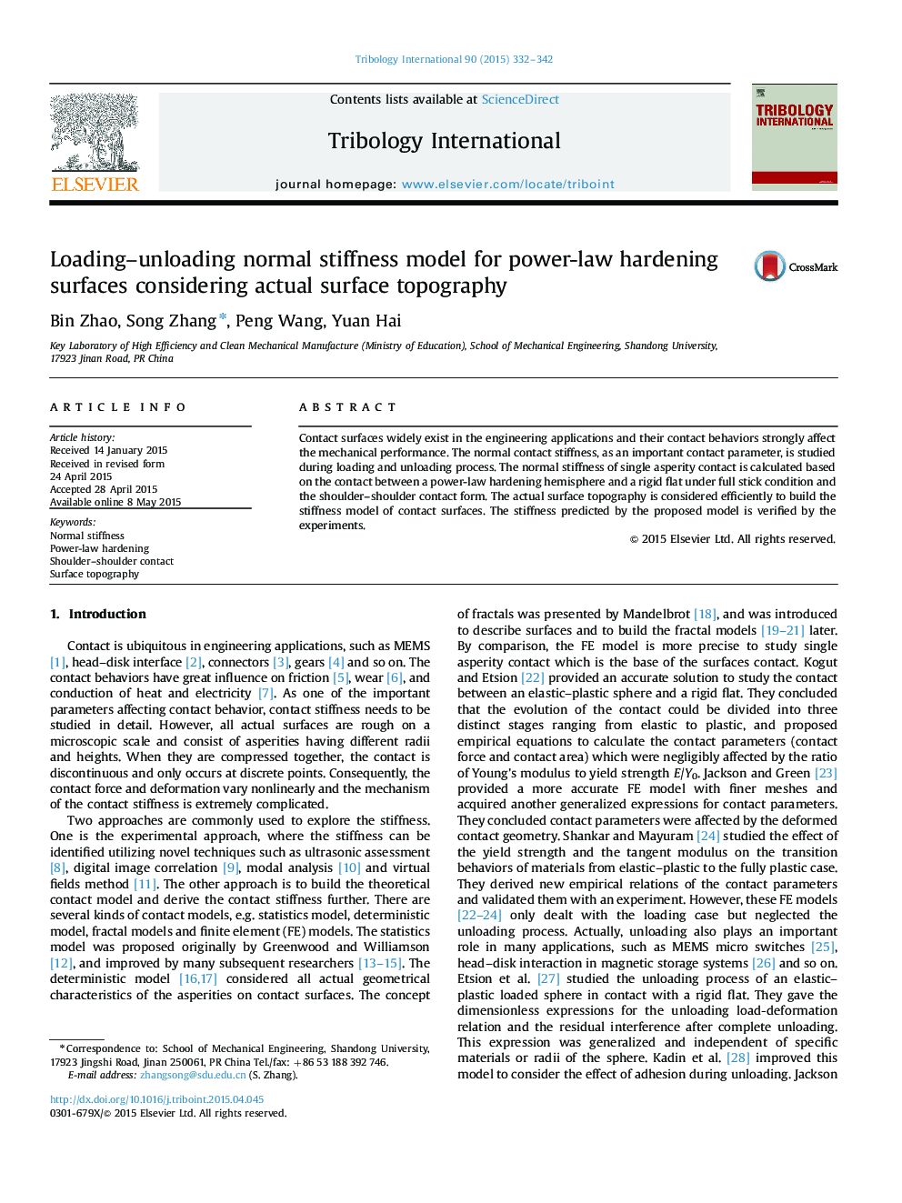 Loading-unloading normal stiffness model for power-law hardening surfaces considering actual surface topography