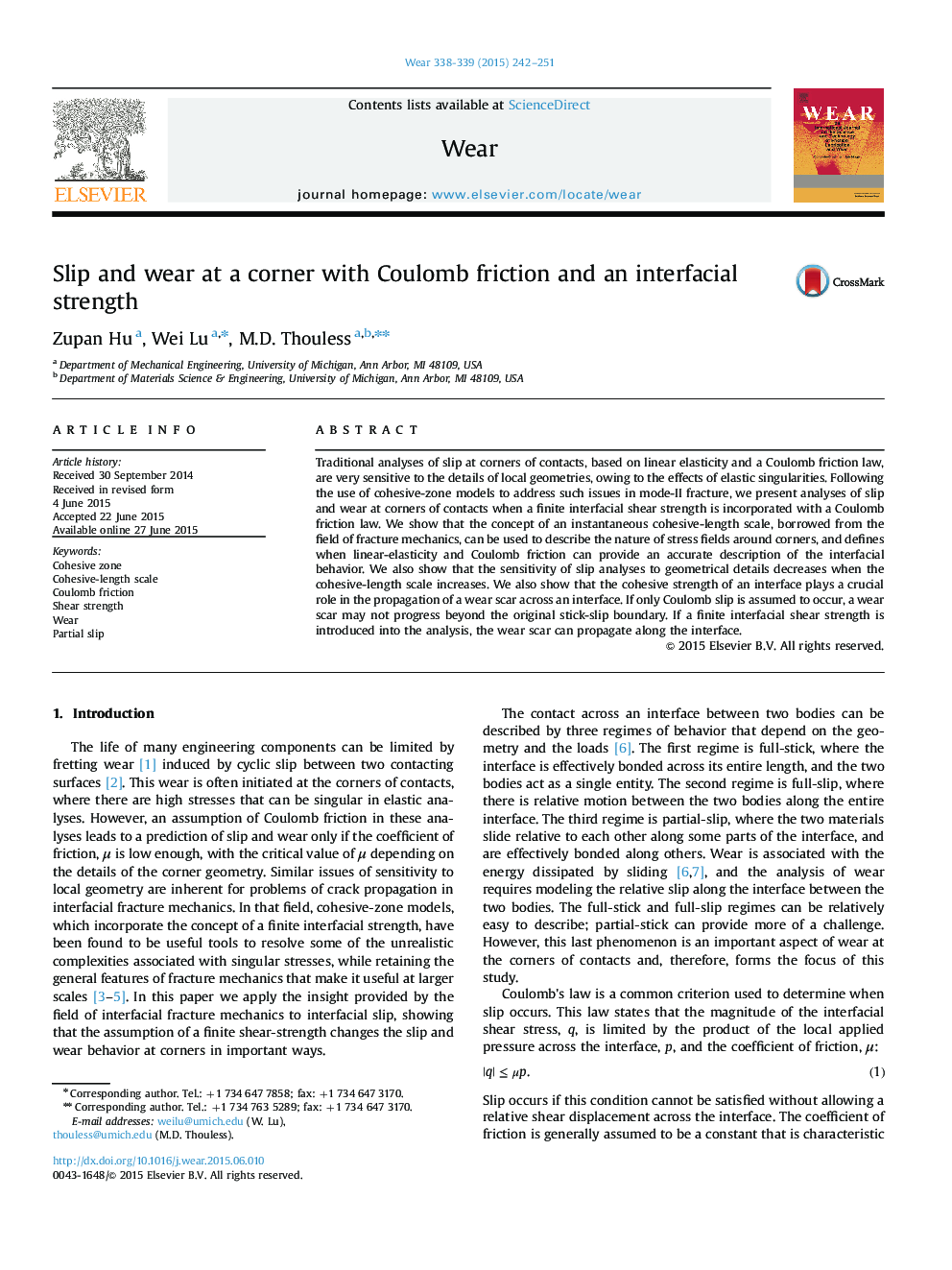 Slip and wear at a corner with Coulomb friction and an interfacial strength