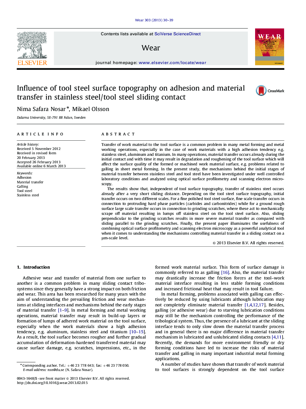 Influence of tool steel surface topography on adhesion and material transfer in stainless steel/tool steel sliding contact