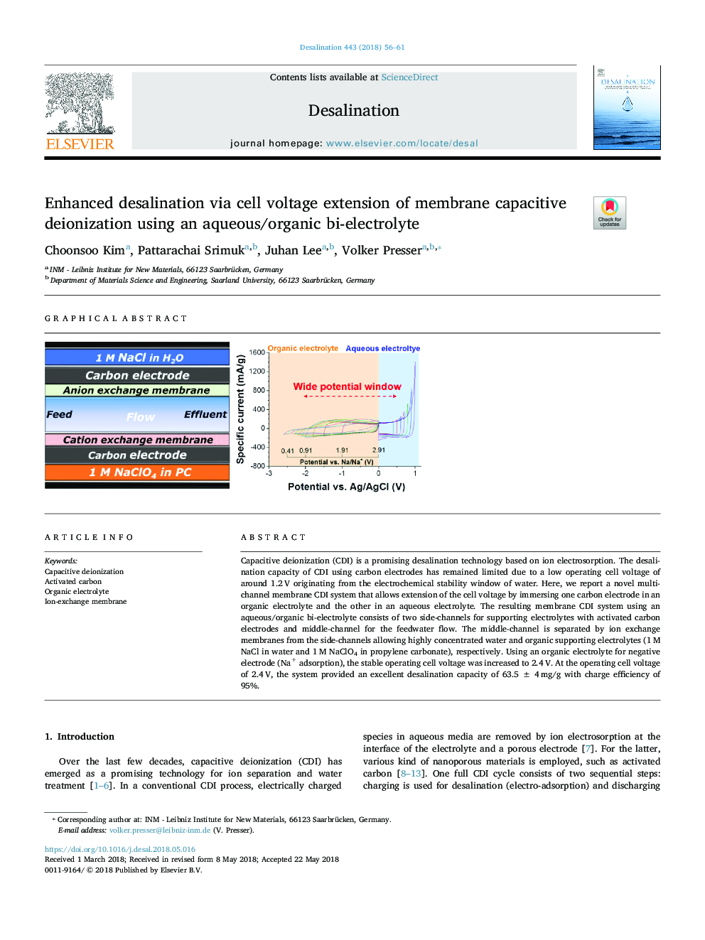 Enhanced desalination via cell voltage extension of membrane capacitive deionization using an aqueous/organic bi-electrolyte