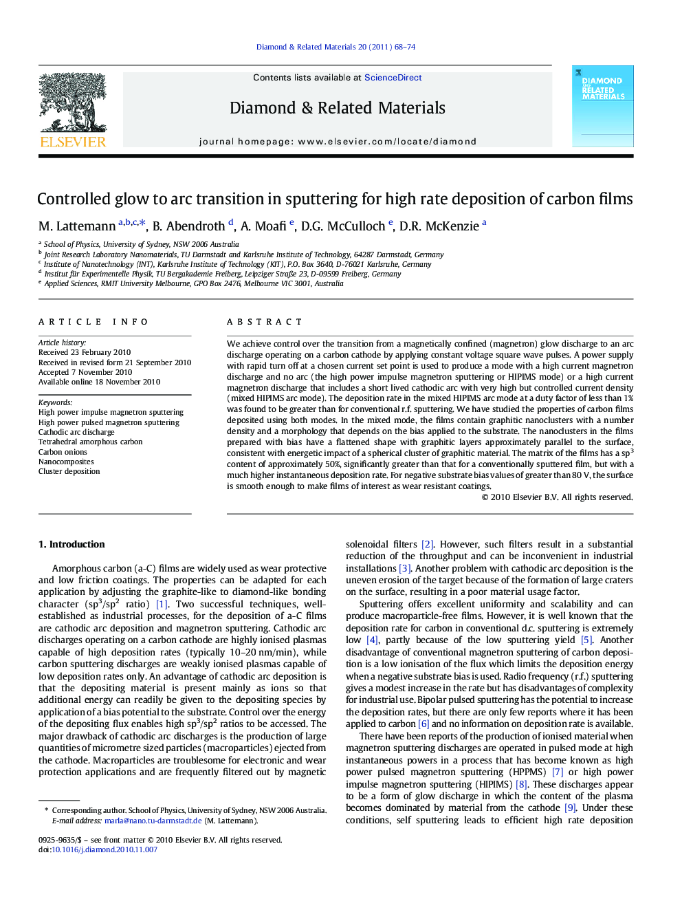 Controlled glow to arc transition in sputtering for high rate deposition of carbon films