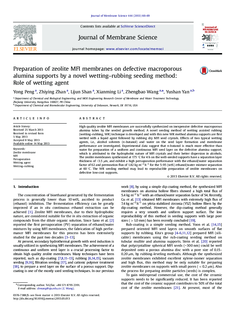 Preparation of zeolite MFI membranes on defective macroporous alumina supports by a novel wetting-rubbing seeding method: Role of wetting agent