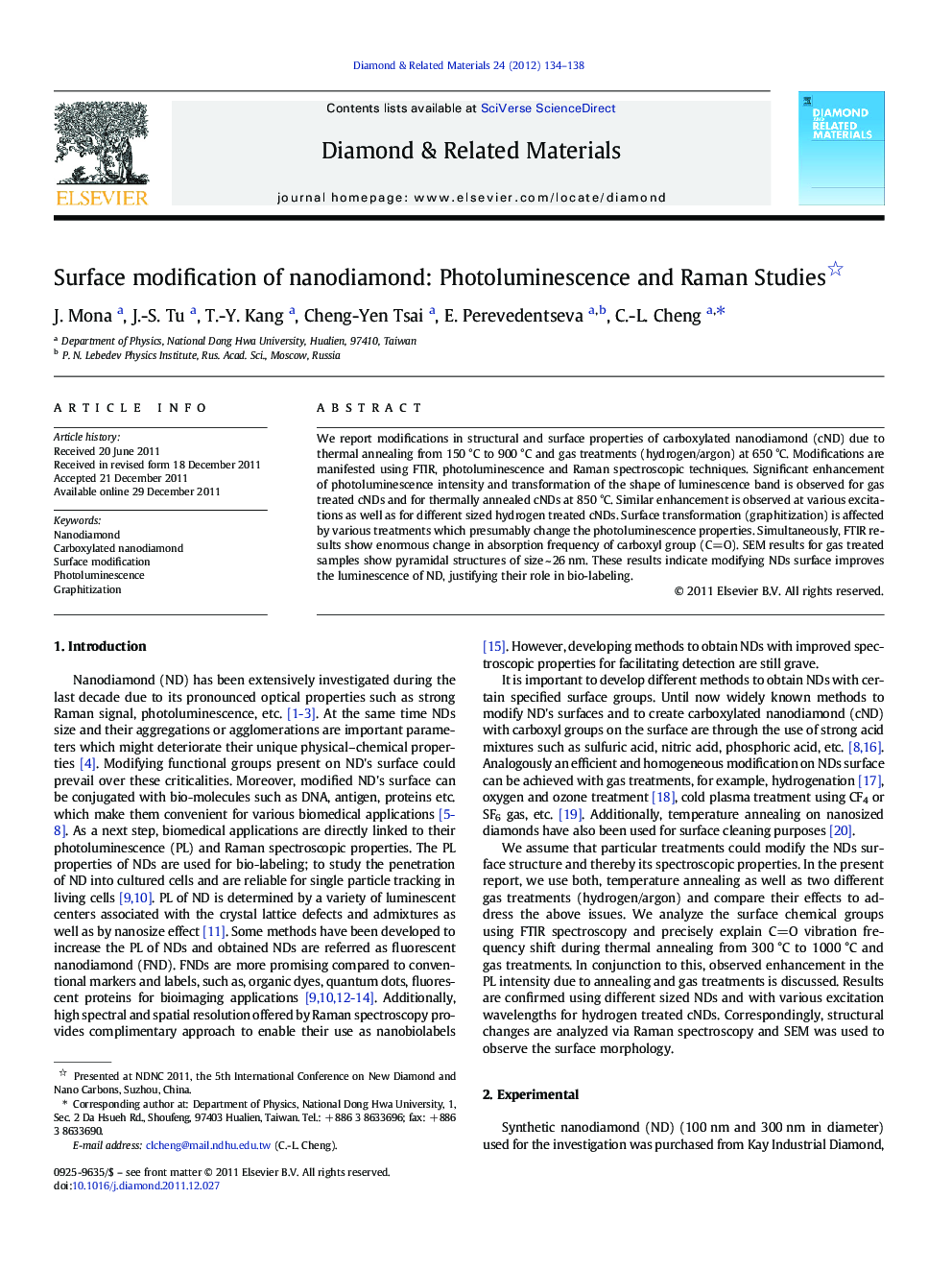 Surface modification of nanodiamond: Photoluminescence and Raman Studies 