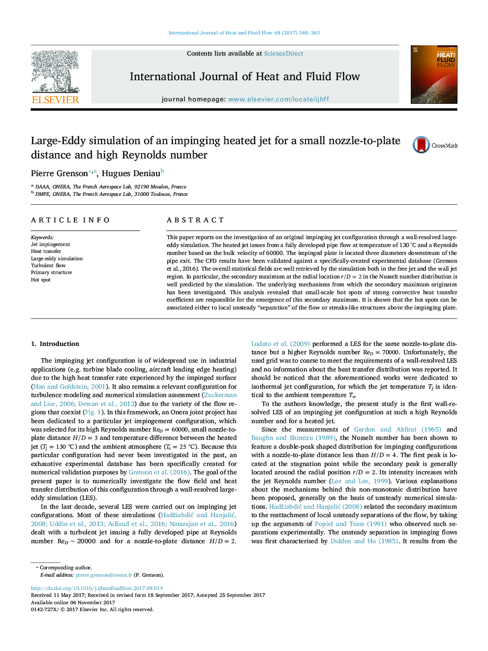 Large-Eddy simulation of an impinging heated jet for a small nozzle-to-plate distance and high Reynolds number