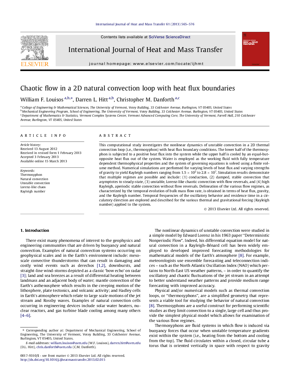 Chaotic flow in a 2D natural convection loop with heat flux boundaries