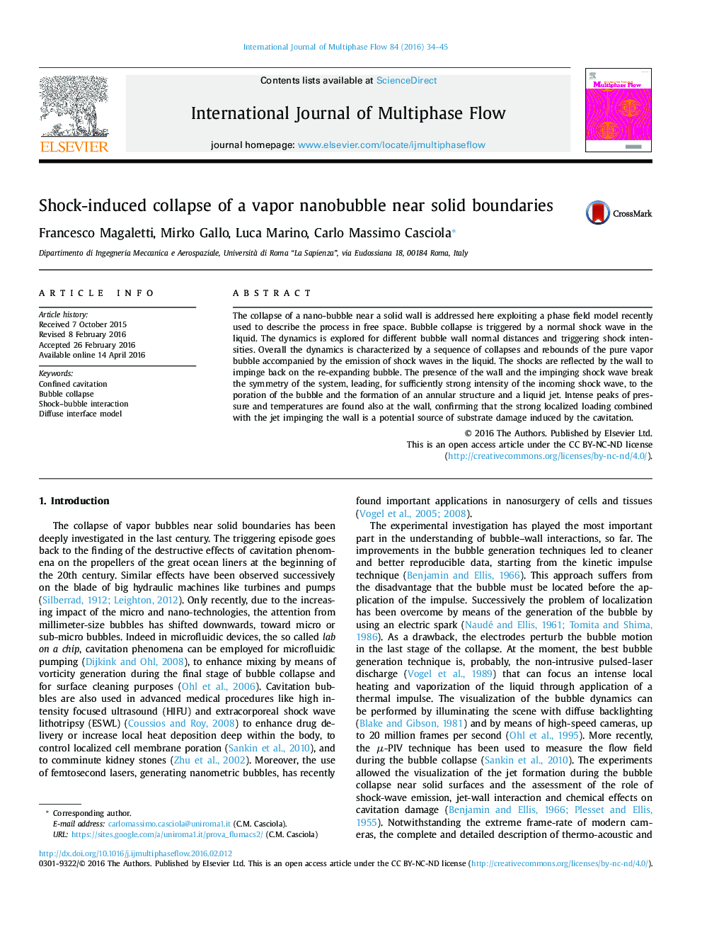 Shock-induced collapse of a vapor nanobubble near solid boundaries