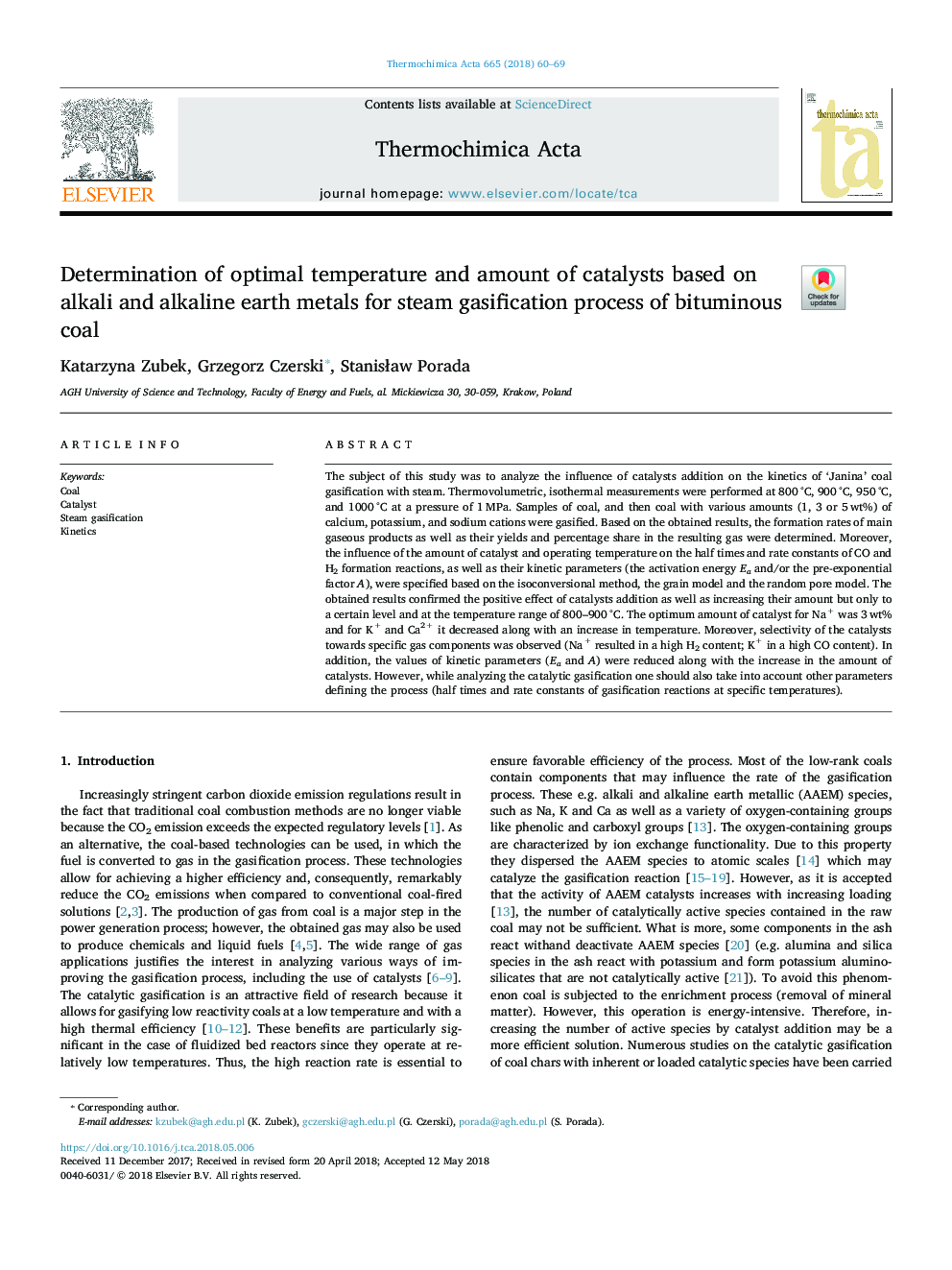 Determination of optimal temperature and amount of catalysts based on alkali and alkaline earth metals for steam gasification process of bituminous coal