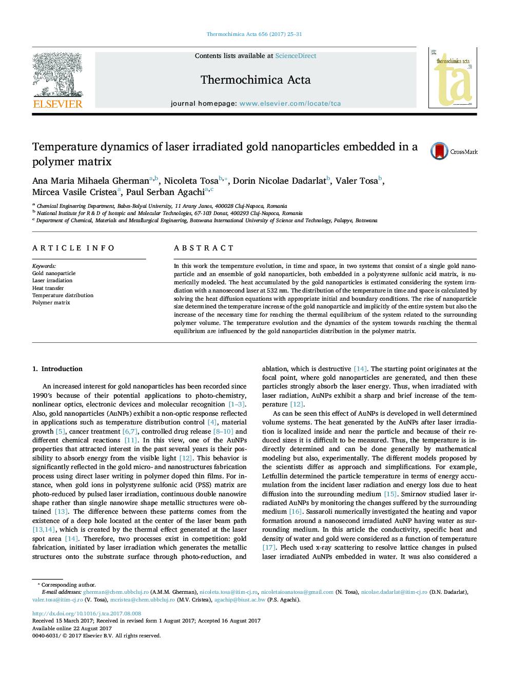 Temperature dynamics of laser irradiated gold nanoparticles embedded in a polymer matrix