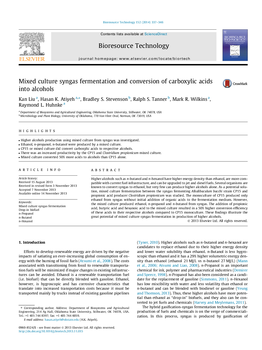 Mixed culture syngas fermentation and conversion of carboxylic acids into alcohols