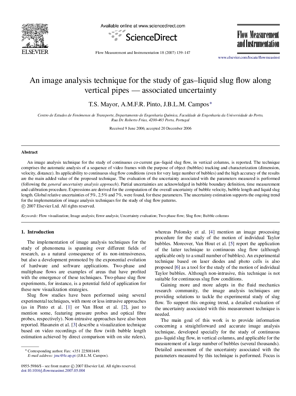 An image analysis technique for the study of gas–liquid slug flow along vertical pipes — associated uncertainty