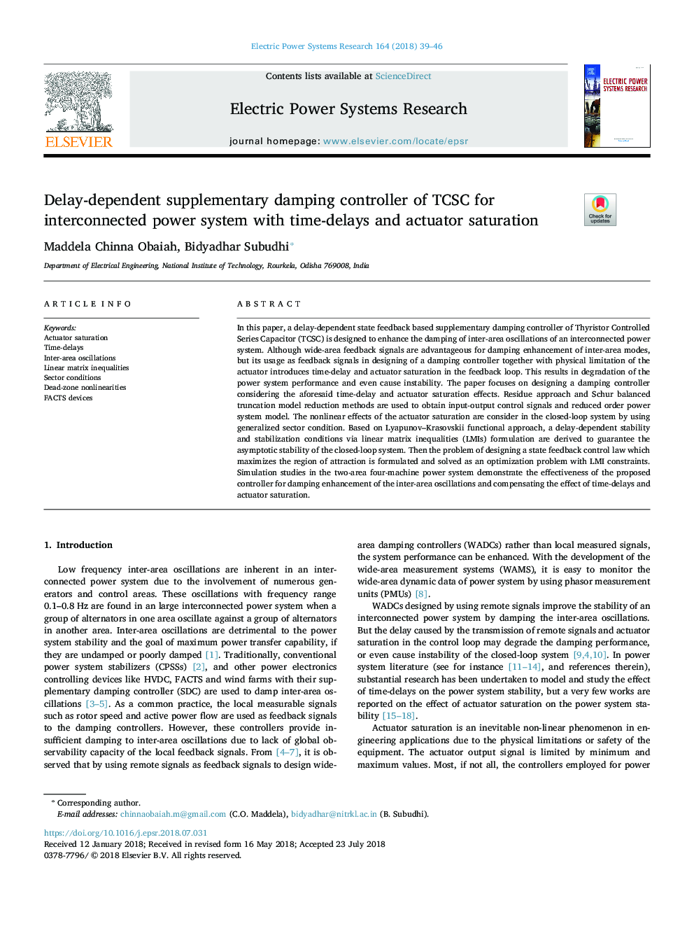 Delay-dependent supplementary damping controller of TCSC for interconnected power system with time-delays and actuator saturation